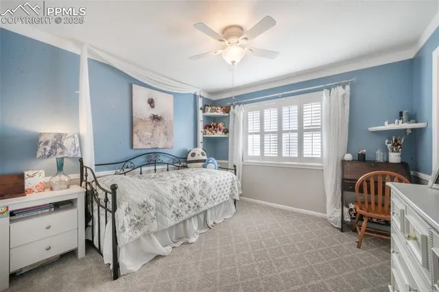 a room with a bed and a mirror