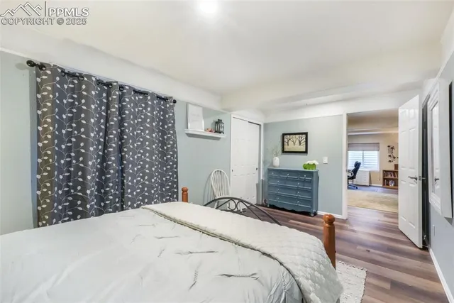 a bathroom with a sink a toilet and a shower