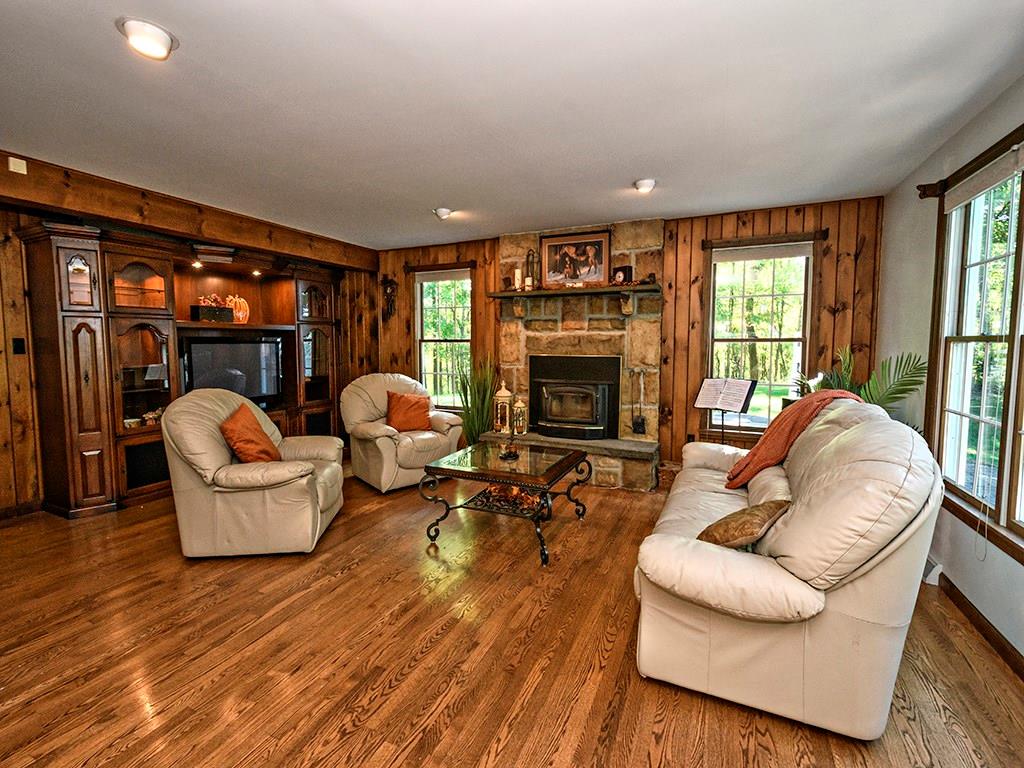 1671 Coulter Road Apollo, PA 15613 - Photo 9 of 25 Living Room w/ Stone Fireplace opens into the Kitchen.