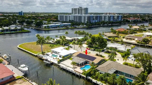 a view of a lake with a house