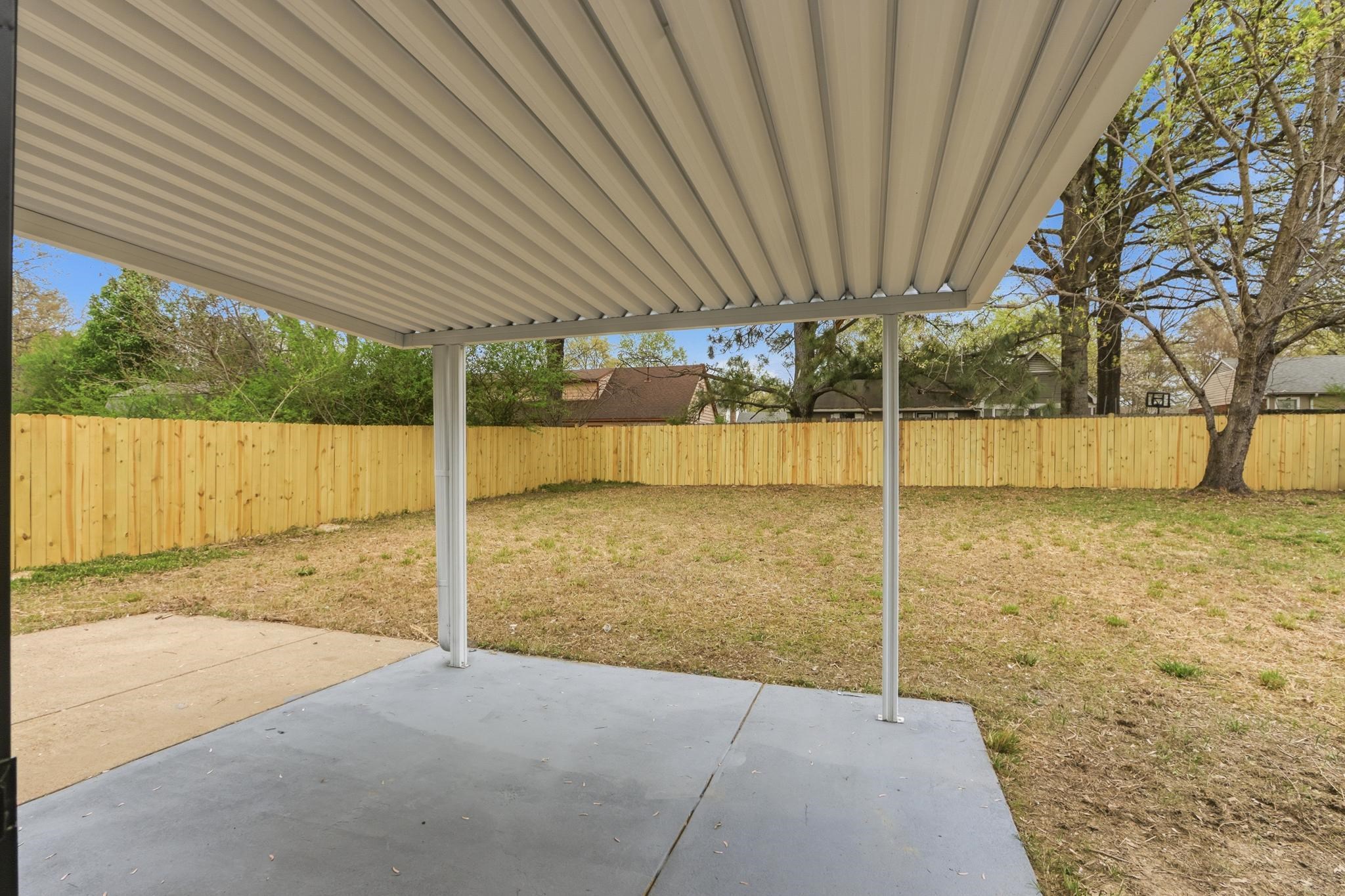 4574 Ross Road Memphis, TN 38141 - Photo 26 of 37 Fenced backyard with a patio