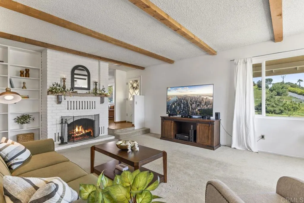 6825 Kellyn Lane Vista, CA 92084 - Photo 13 of 65 a living room with furniture fireplace and window