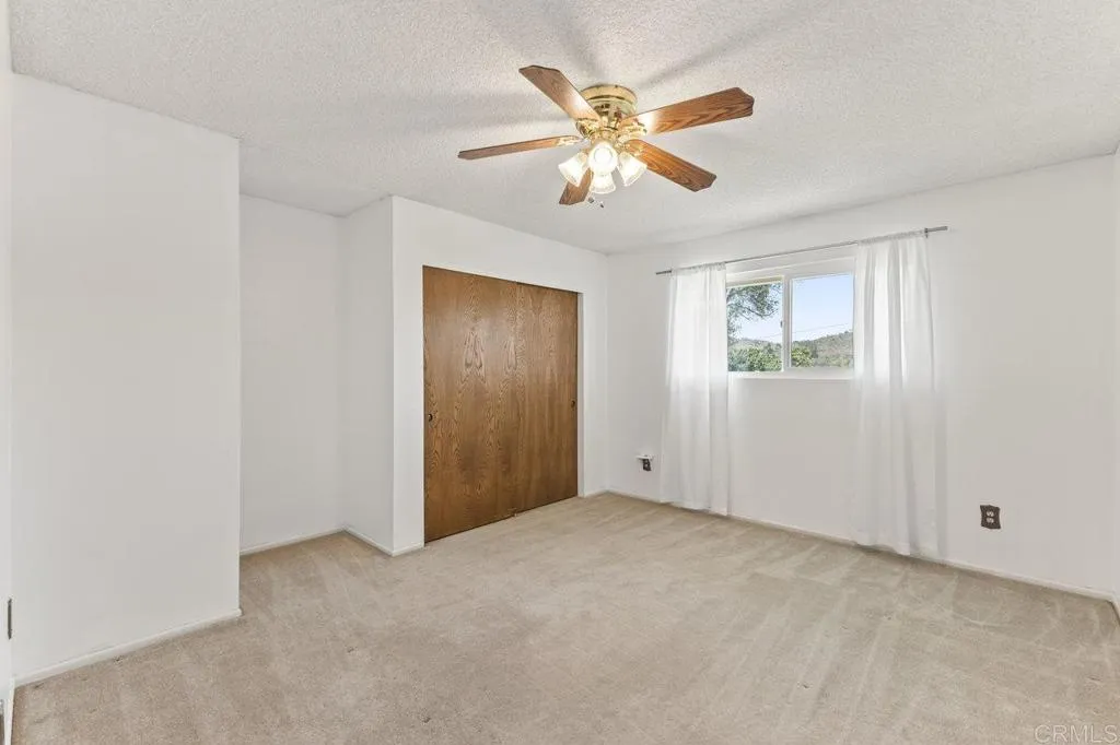 6825 Kellyn Lane Vista, CA 92084 - Photo 38 of 65 a view of an empty room with a window