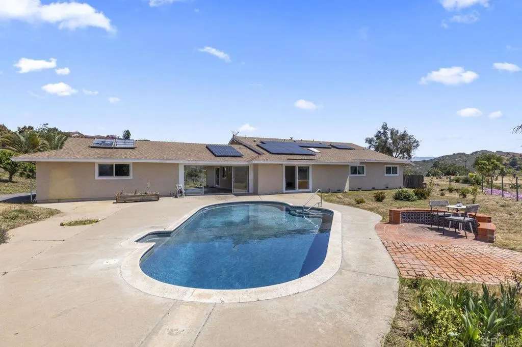 6825 Kellyn Lane Vista, CA 92084 - Photo 41 of 65 a view of a house with a swimming pool