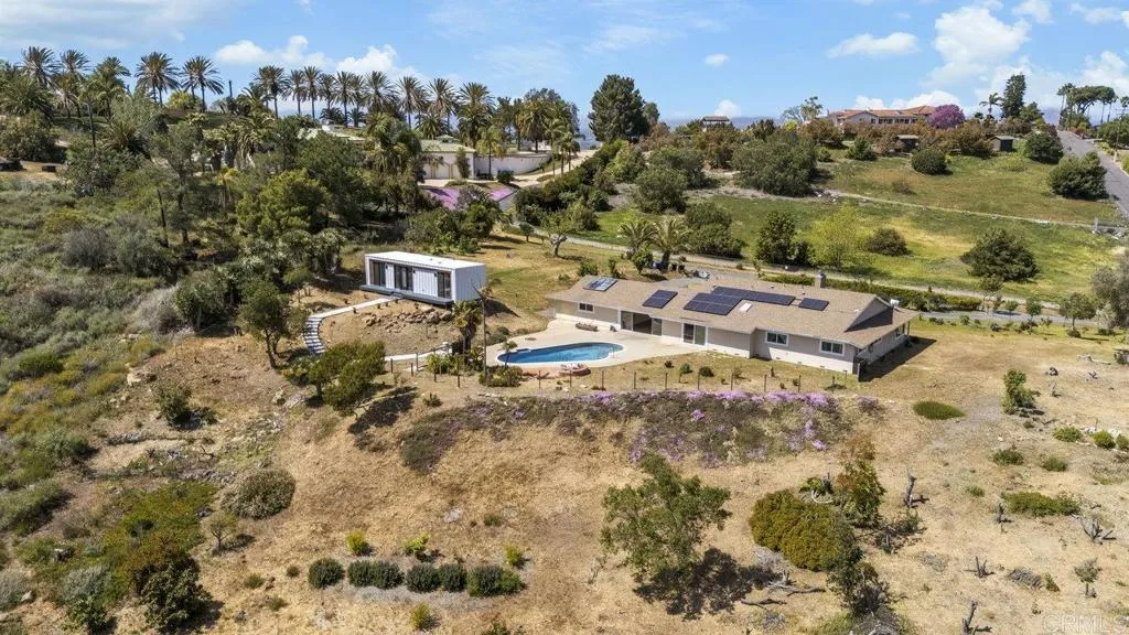6825 Kellyn Lane Vista, CA 92084 - Photo 56 of 65 an aerial view of a house with a yard
