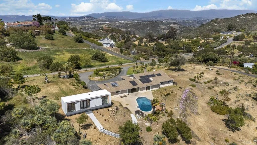 6825 Kellyn Lane Vista, CA 92084 - Photo 58 of 65 an aerial view of a house with a yard