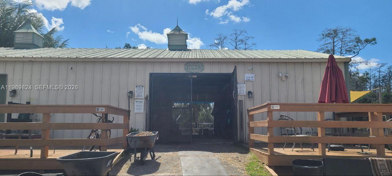 10920 Barn Road Lake Worth, FL 33449 - Photo 5 of 19 a kitchen with a sink and cabinets