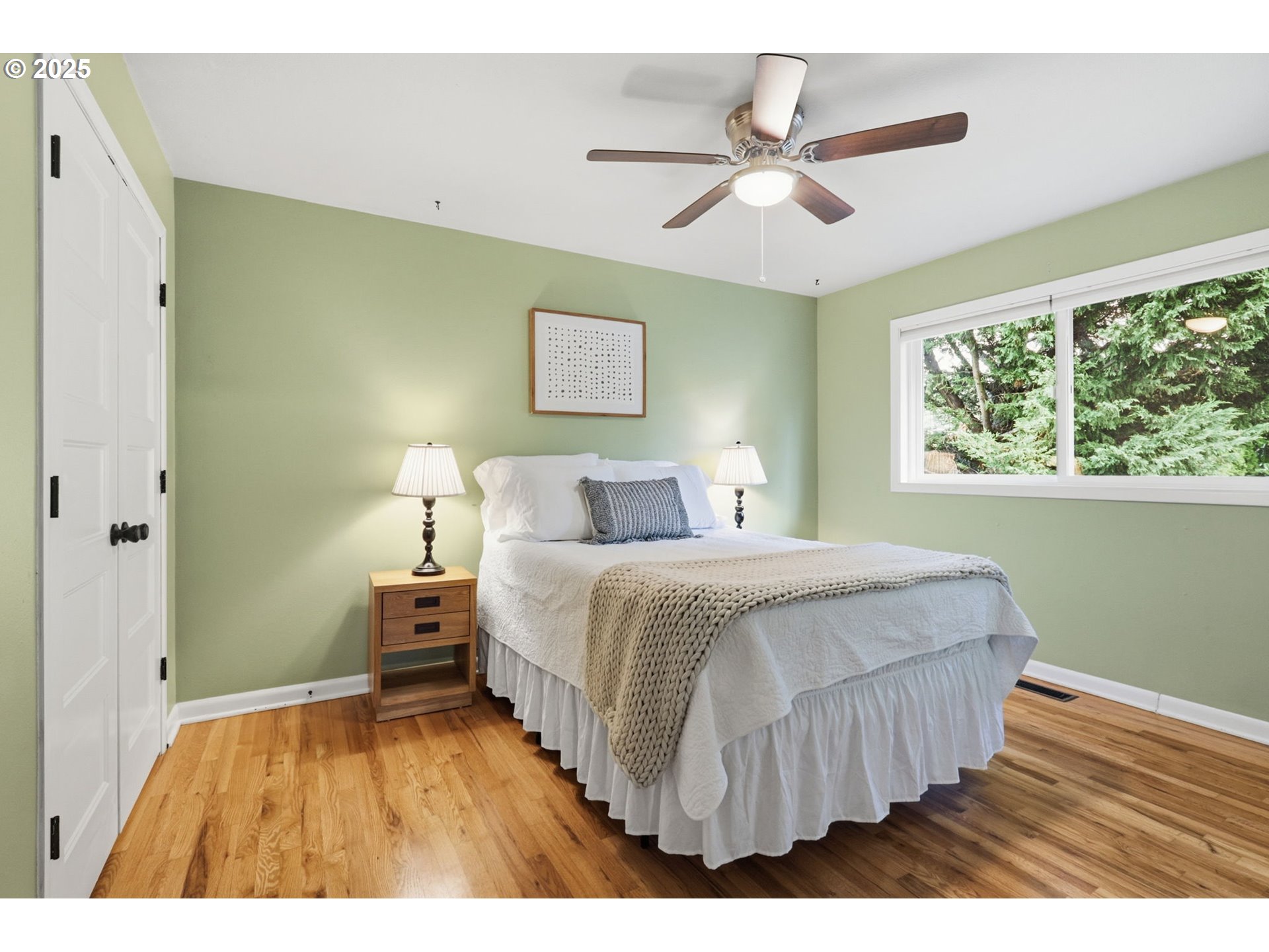 8502 North Hamlin Avenue Portland, OR 97217 - Photo 15 of 48 a bedroom with a bed and window