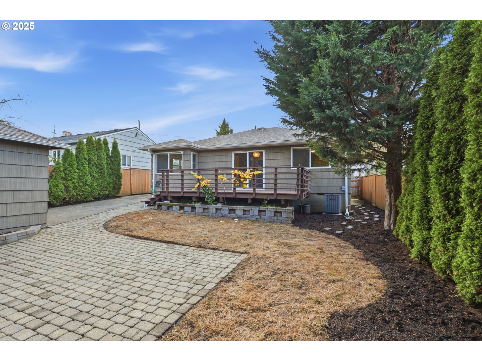 8502 North Hamlin Avenue Portland, OR 97217 - Photo 32 of 48 a view of a house with a patio