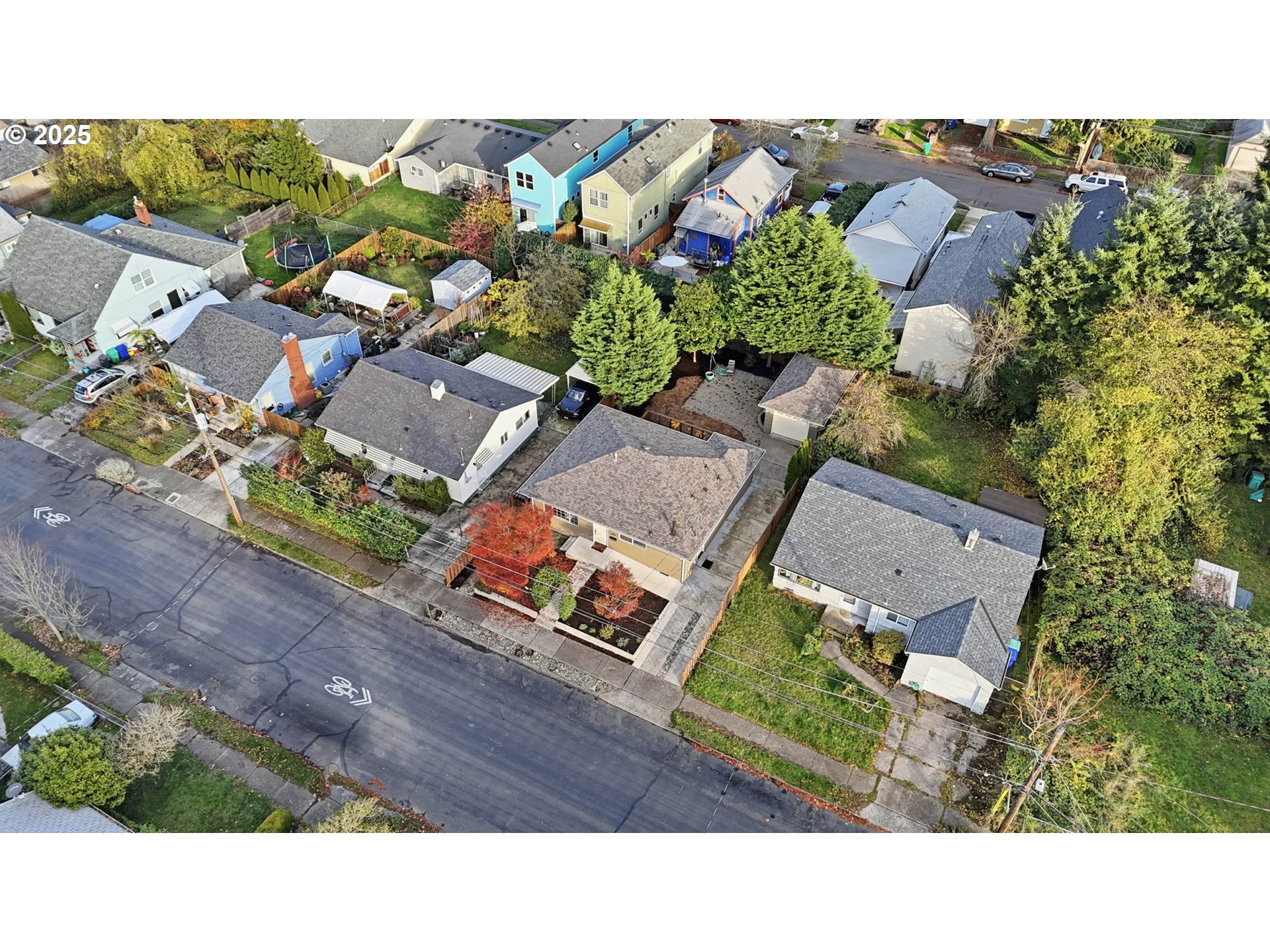 8502 North Hamlin Avenue Portland, OR 97217 - Photo 37 of 48 an aerial view of a house with a yard