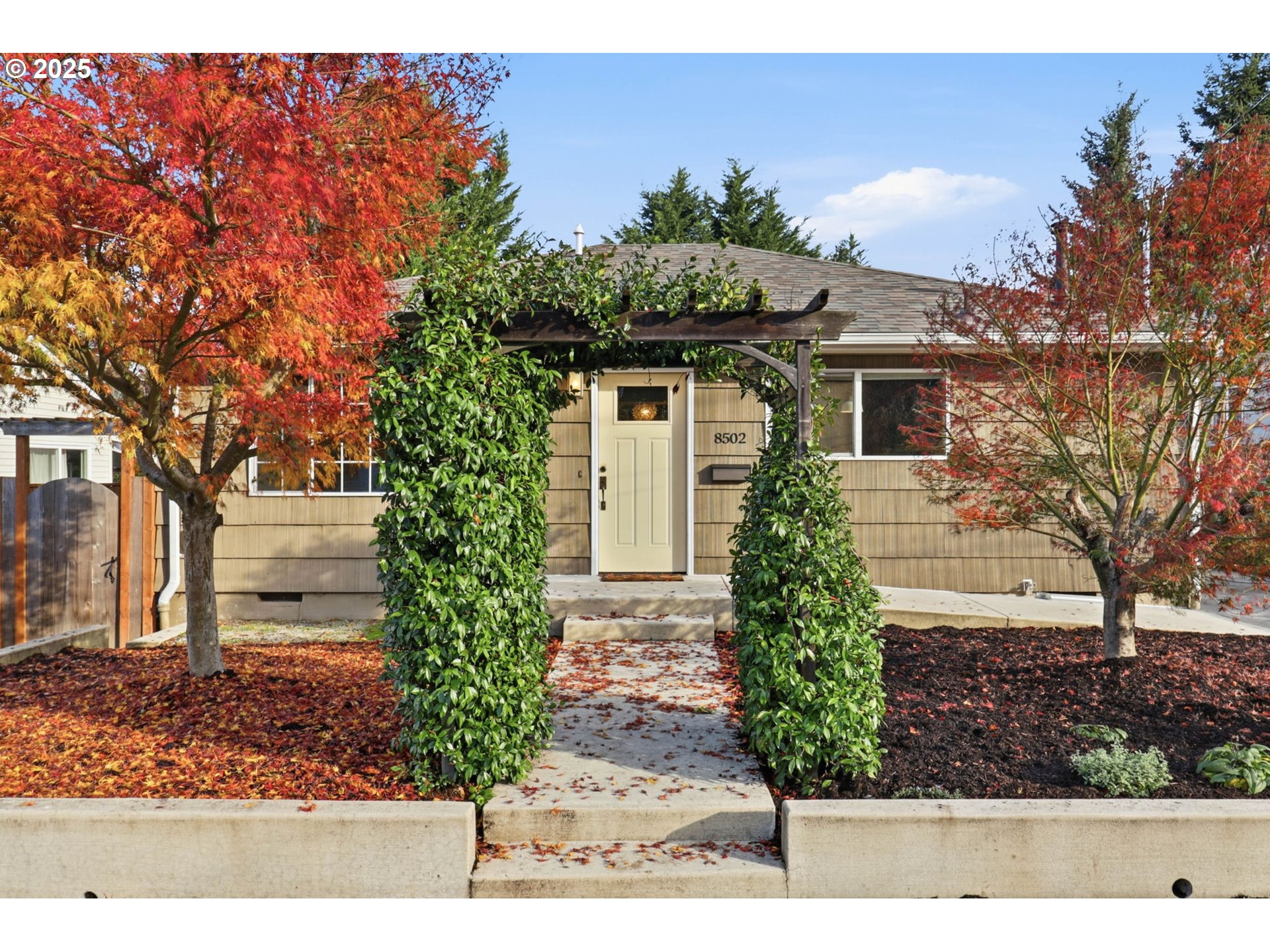 8502 North Hamlin Avenue Portland, OR 97217 - Photo 42 of 48 a front view of a house with garden