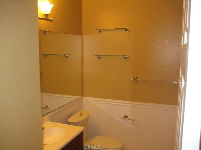 a bathroom with a toilet and shower