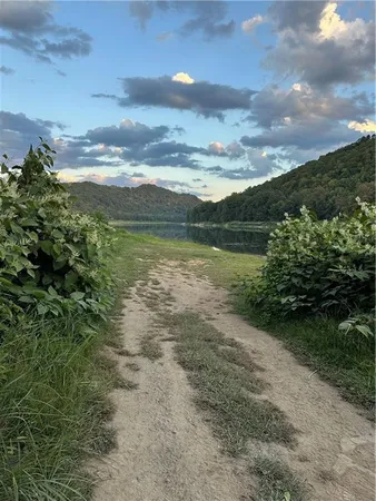 a view of lake with mountain