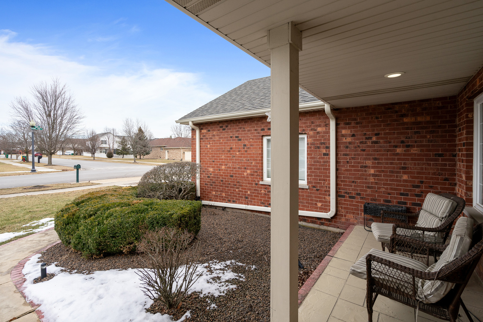 16551 SpringView Drive Lockport, IL 60441 - Photo 28 of 47 a view of a porch with furniture and a yard