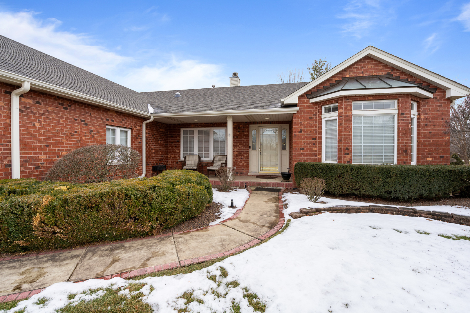 16551 SpringView Drive Lockport, IL 60441 - Photo 32 of 47 a front view of a house with a yard