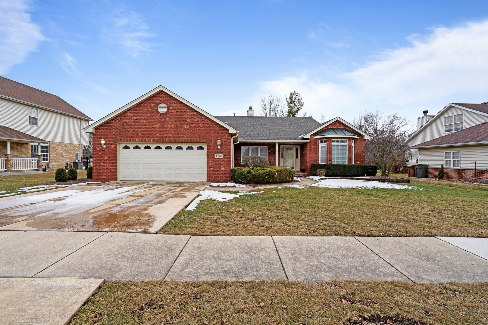 16551 SpringView Drive Lockport, IL 60441 - Photo 33 of 47 a front view of a house with a yard