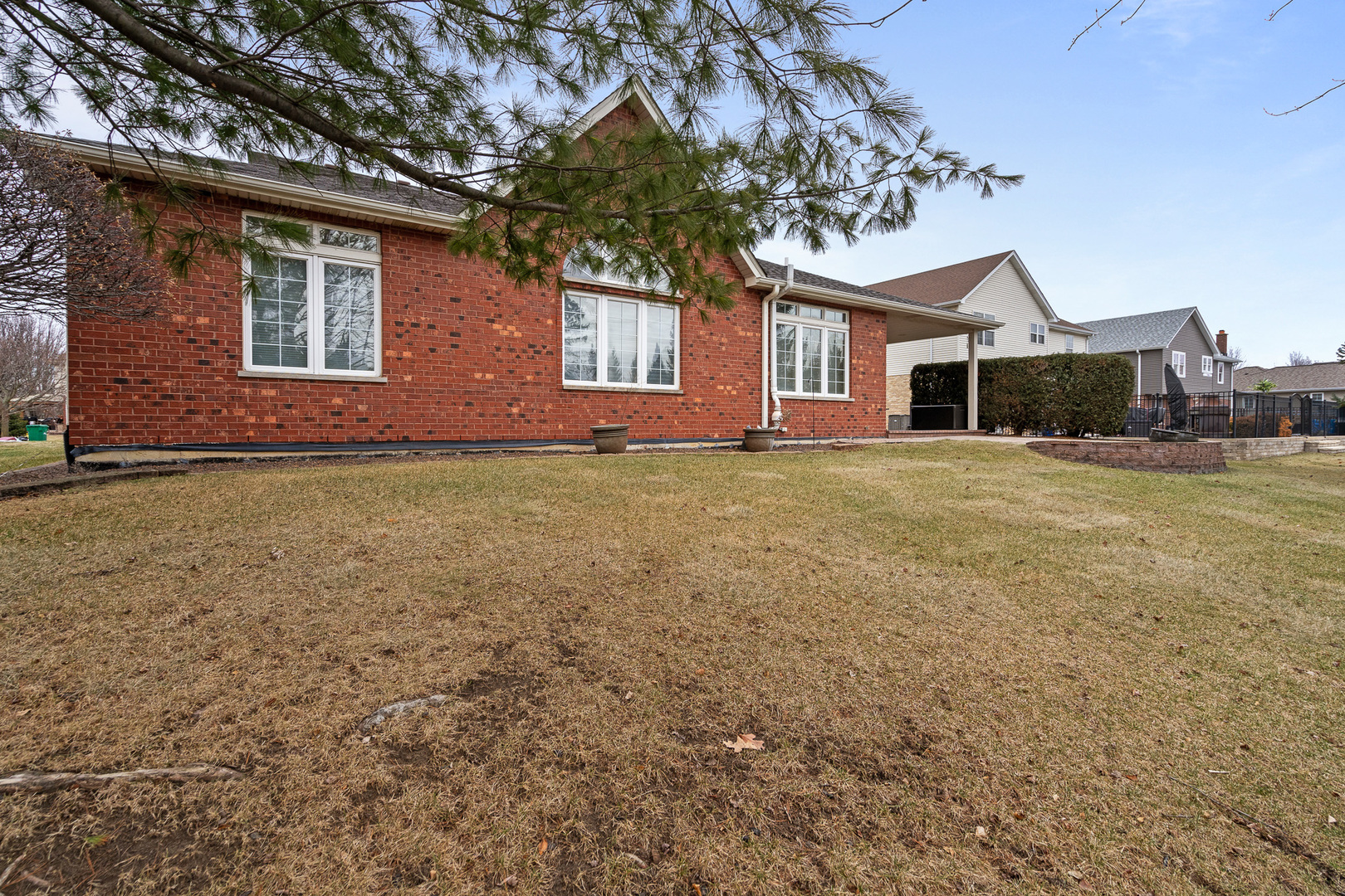 16551 SpringView Drive Lockport, IL 60441 - Photo 41 of 47 a house that has a tree in front of it