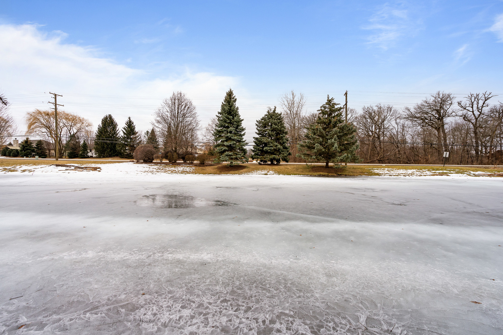 16551 SpringView Drive Lockport, IL 60441 - Photo 44 of 47 a view of a road with a building in the background