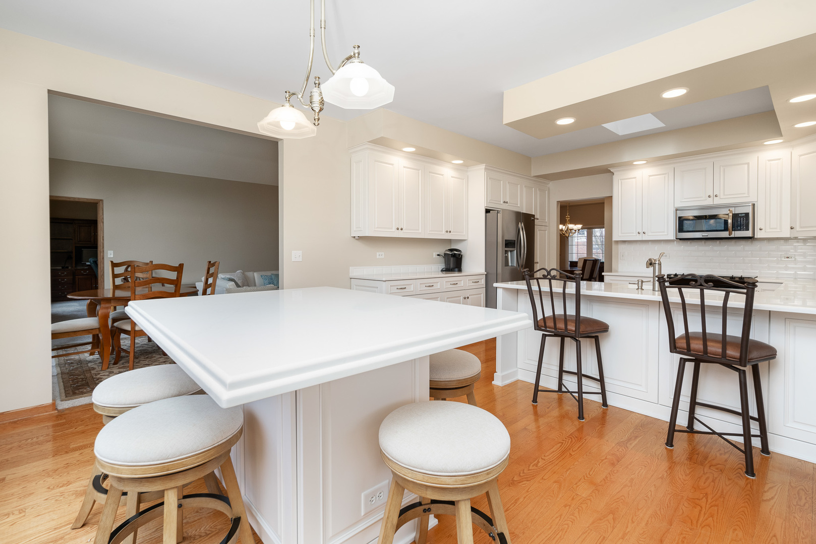16551 SpringView Drive Lockport, IL 60441 - Photo 6 of 47 a large kitchen with a table and chairs