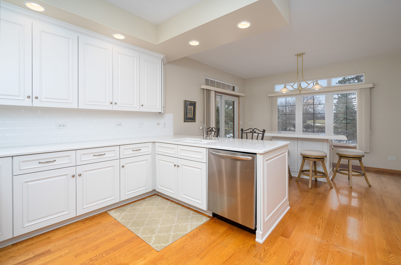 16551 SpringView Drive Lockport, IL 60441 - Photo 9 of 47 a kitchen with white cabinets and sink