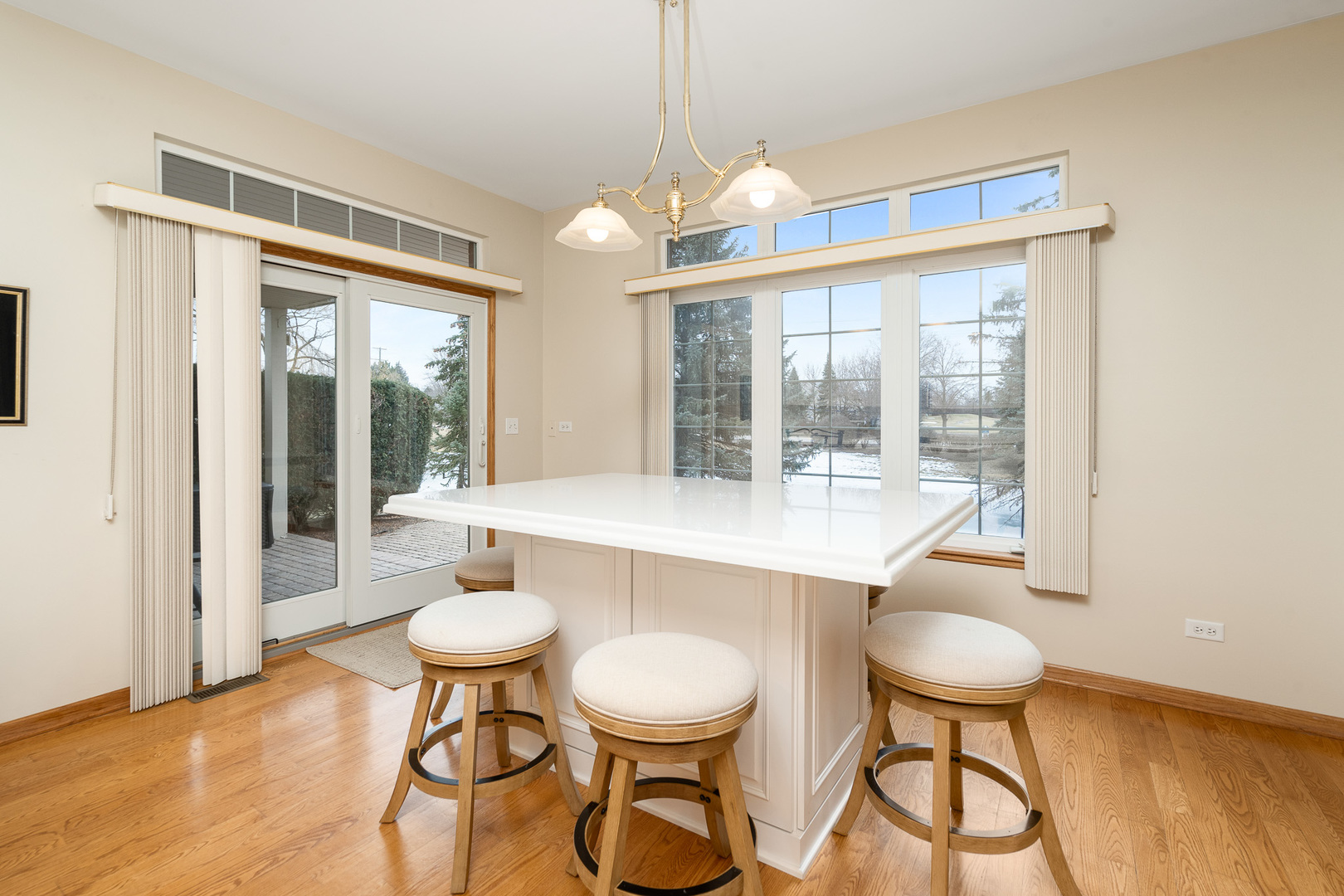 16551 SpringView Drive Lockport, IL 60441 - Photo 10 of 47 a dining room with wooden floor table and chairs