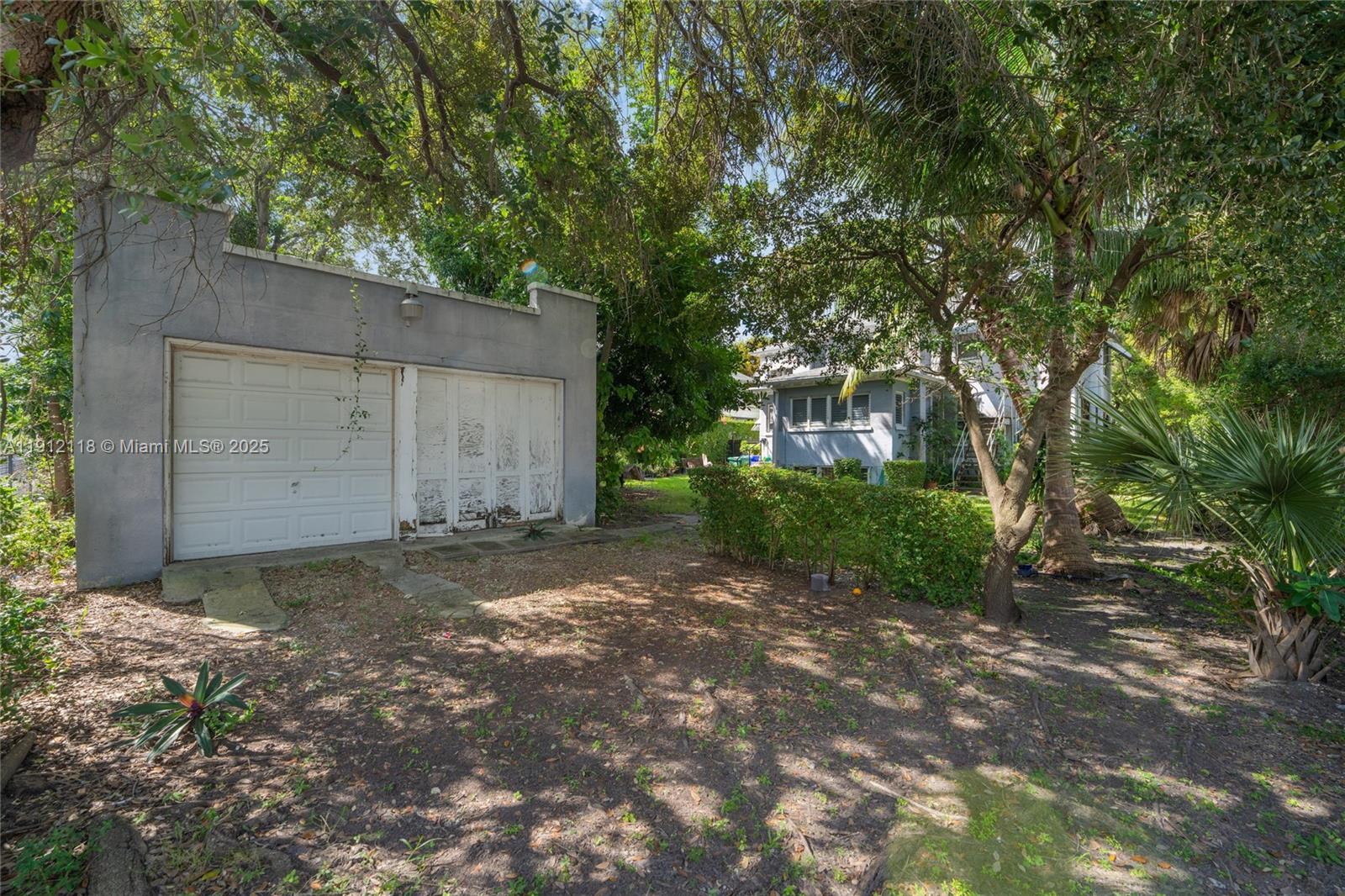 405 Southwest 11th Avenue Miami, FL 33130 - Photo 21 of 26 a view of a house with a tree