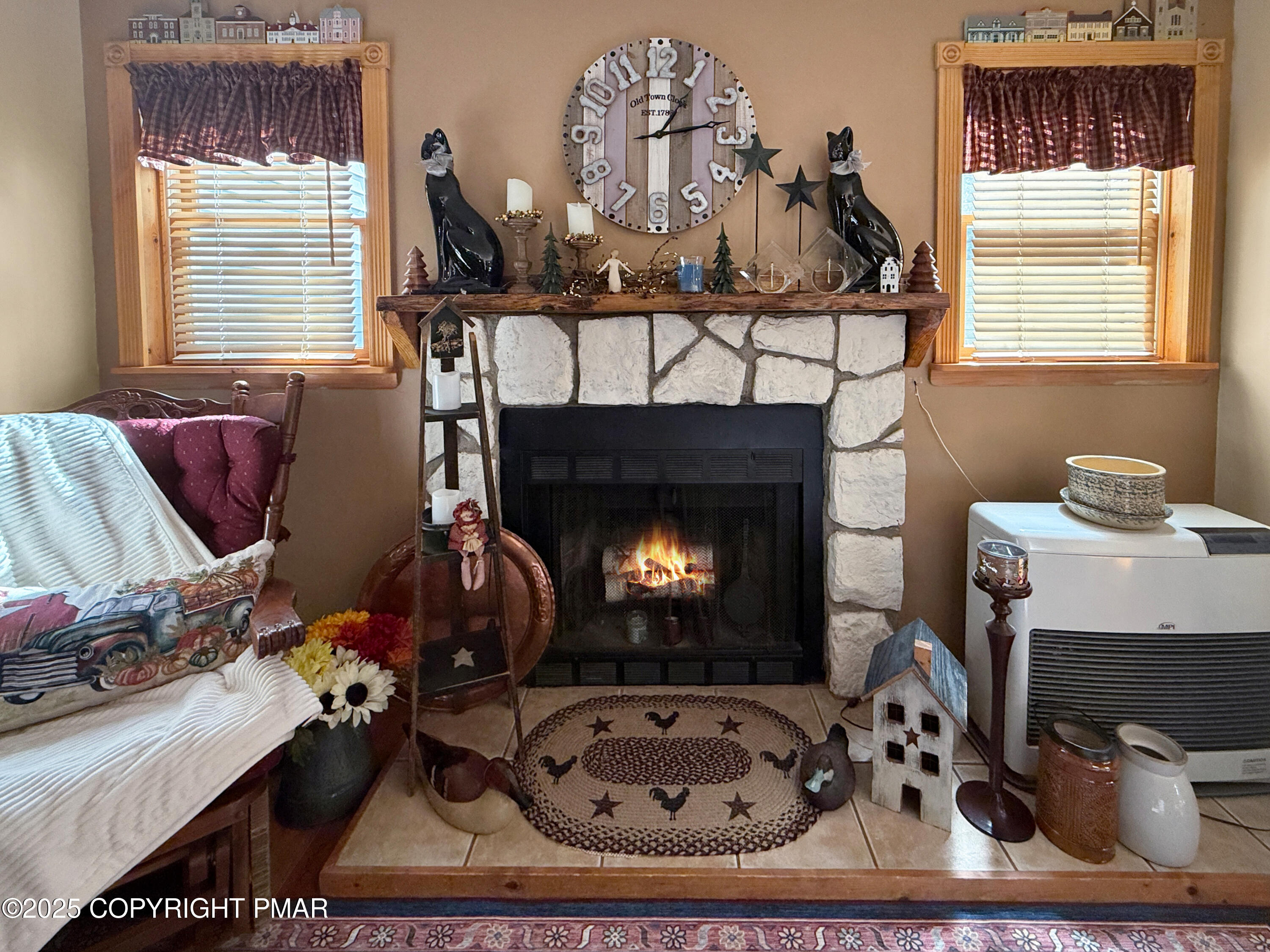 274 Nittany Court Mount Pocono, PA 18344 - Photo 12 of 28 a living room with furniture and a fireplace