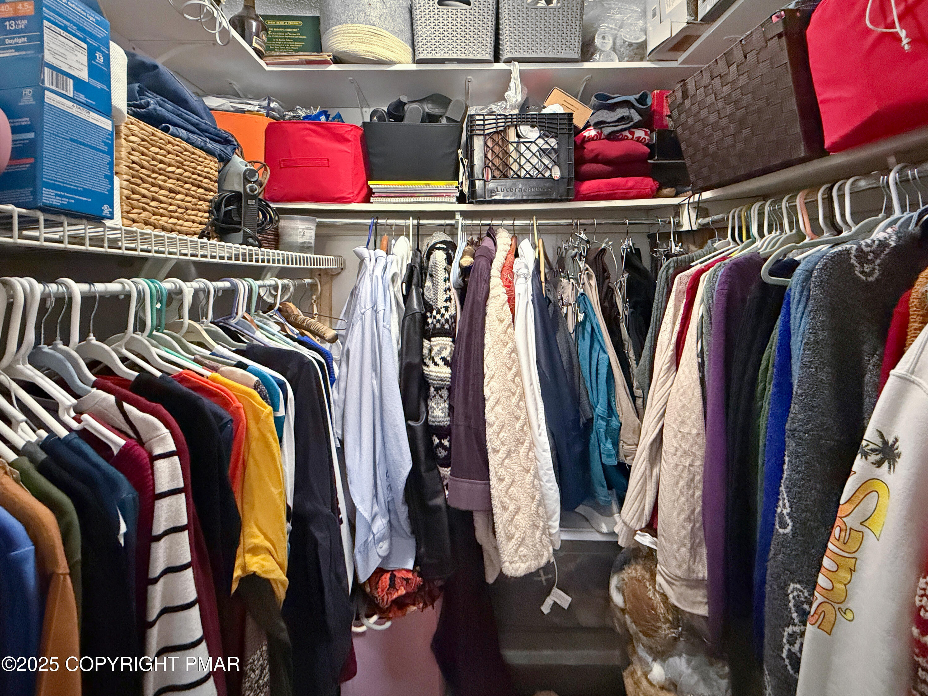 274 Nittany Court Mount Pocono, PA 18344 - Photo 25 of 28 a view of walk in closet with clothes and shoes