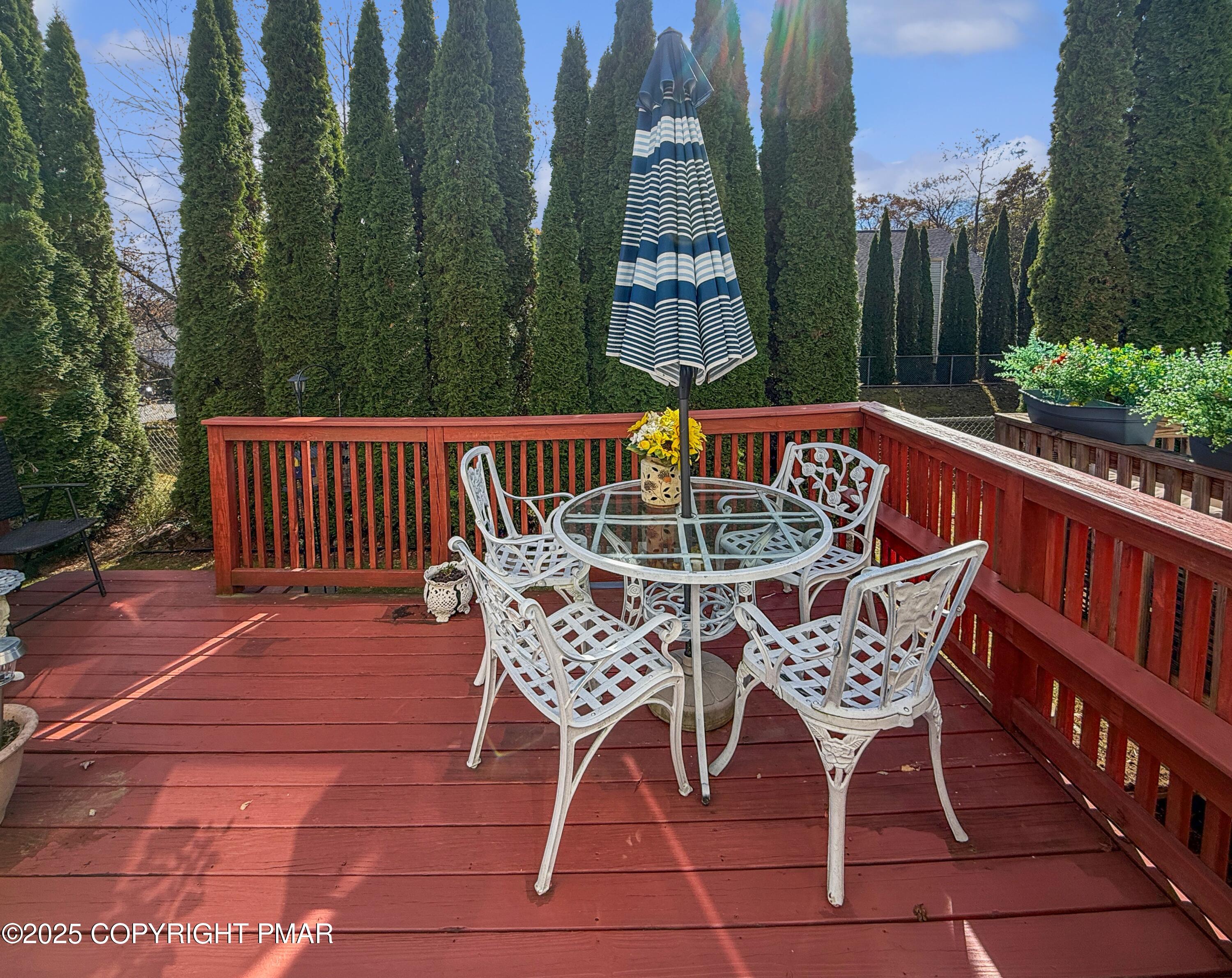 274 Nittany Court Mount Pocono, PA 18344 - Photo 26 of 28 a patio with glass top table and chairs