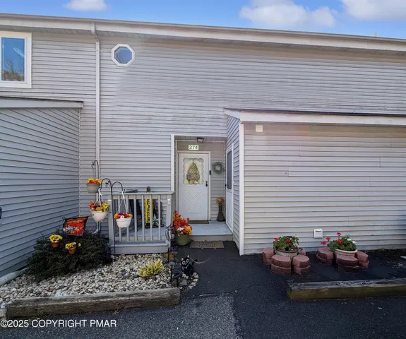 a kitchen with a sink stove and refrigerator