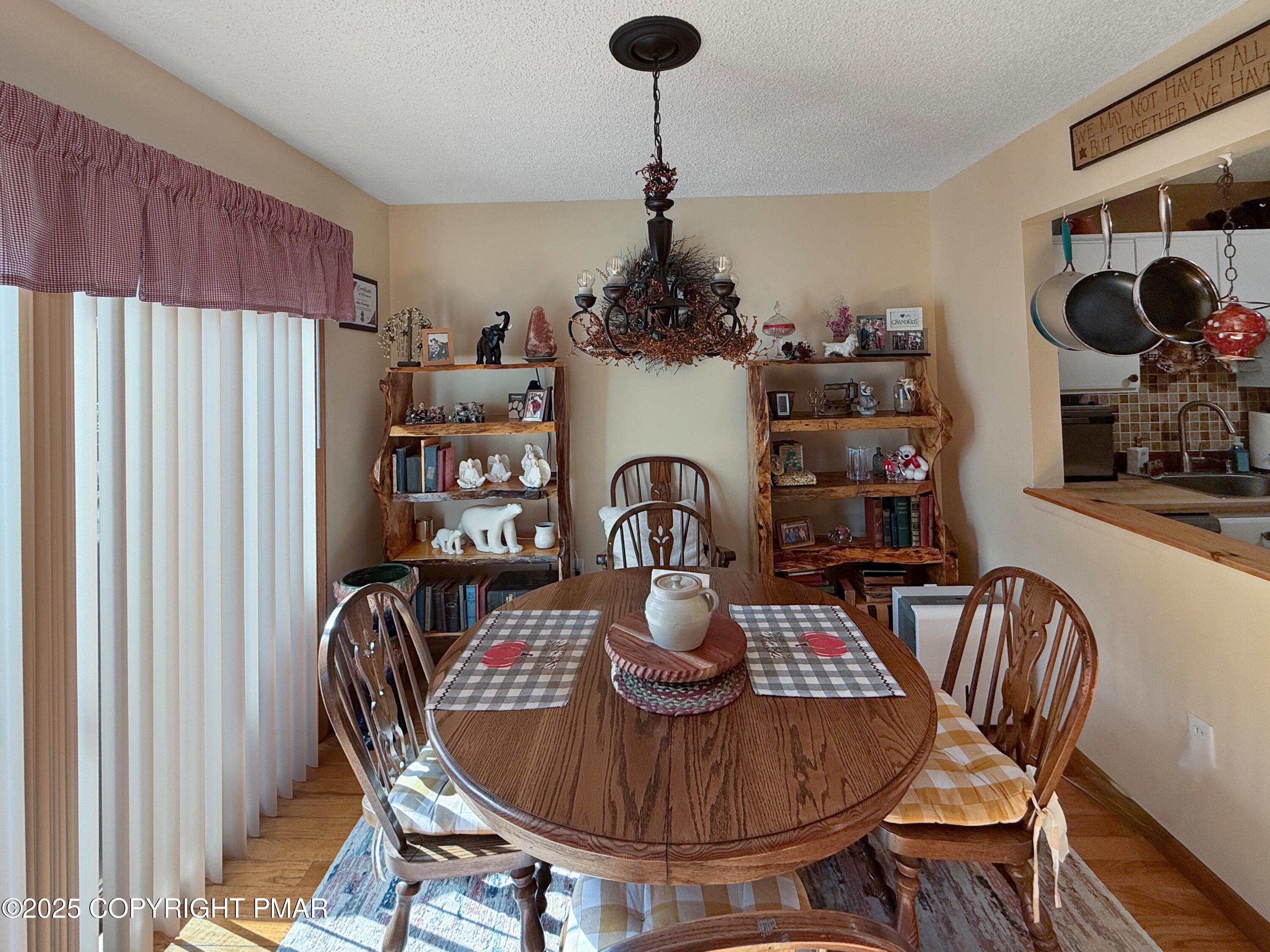 274 Nittany Court Mount Pocono, PA 18344 - Photo 9 of 28 a dining room with furniture and chandelier