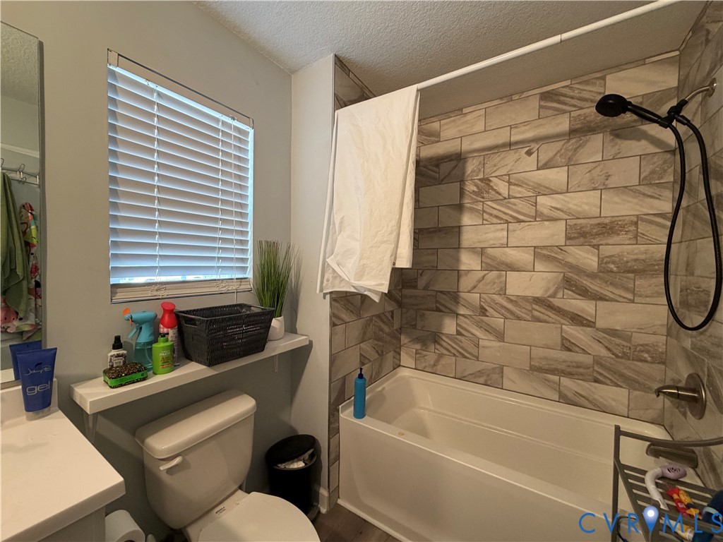1124 Myrtle Street Suffolk, VA 23434 - Photo 7 of 15 Bathroom featuring a tub/shower combination with s