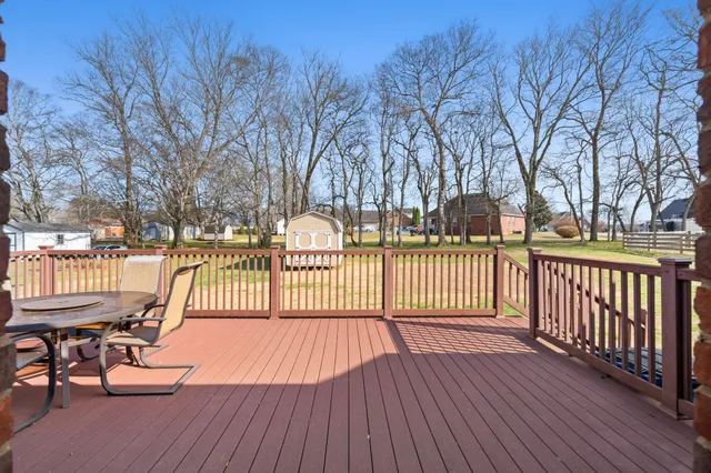 a house with swimming pool in front of it