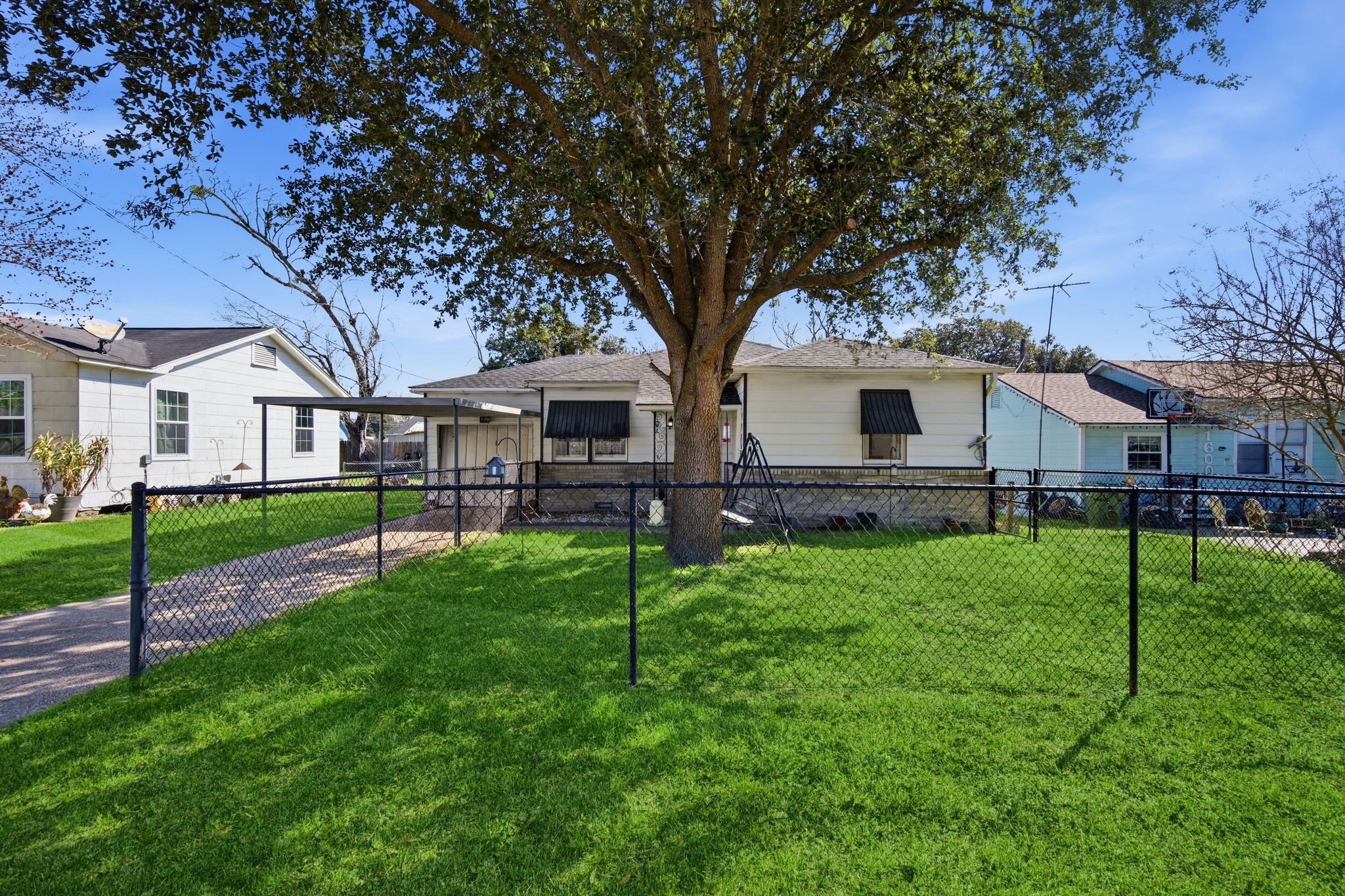 1604 Kipling Street Liberty, TX 77575 - Photo 1 of 19 a view of house with backyard
