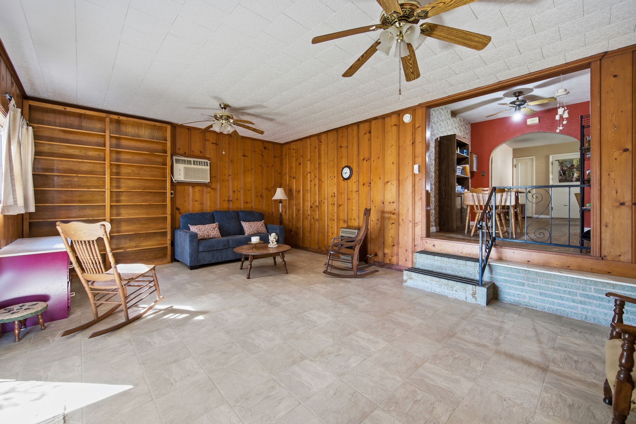 1604 Kipling Street Liberty, TX 77575 - Photo 11 of 19 a living room with furniture a ceiling fan and a rug