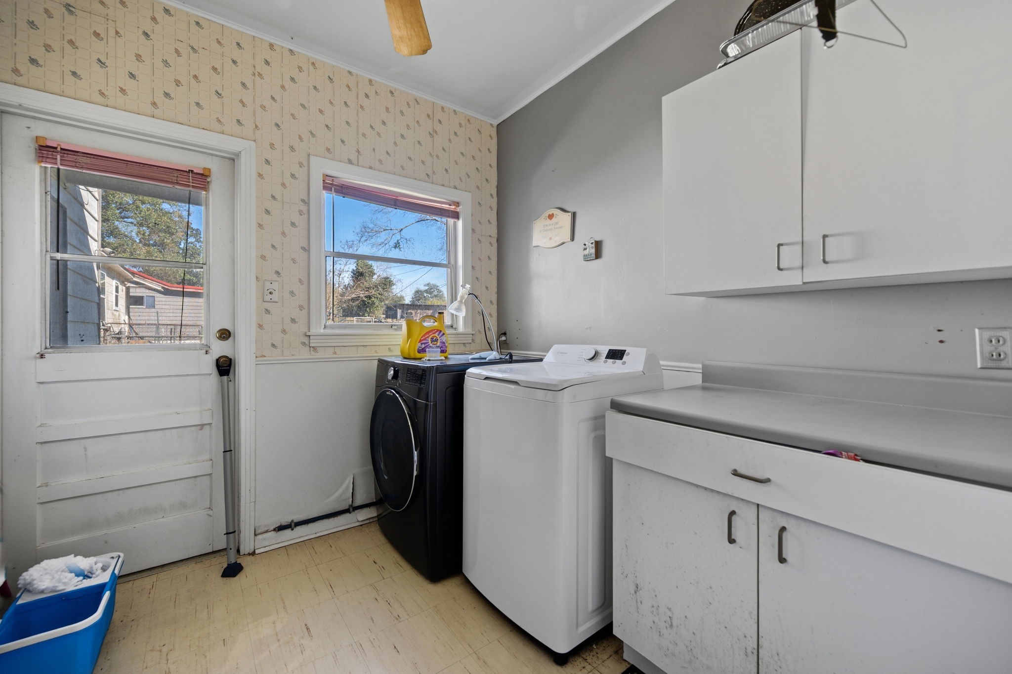 1604 Kipling Street Liberty, TX 77575 - Photo 16 of 19 a view of storage and utility room with washer and dryer