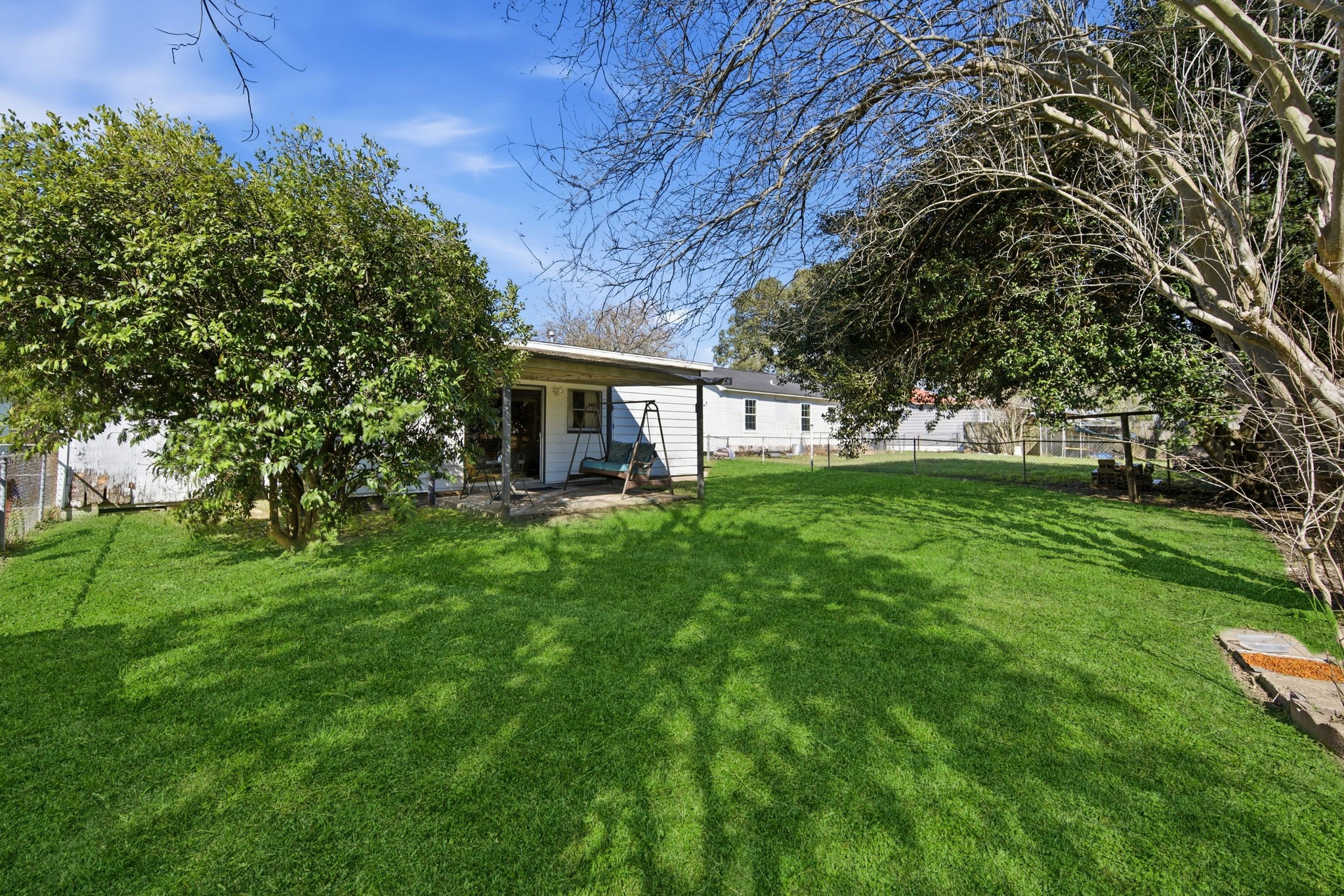 1604 Kipling Street Liberty, TX 77575 - Photo 18 of 19 a view of house with a yard