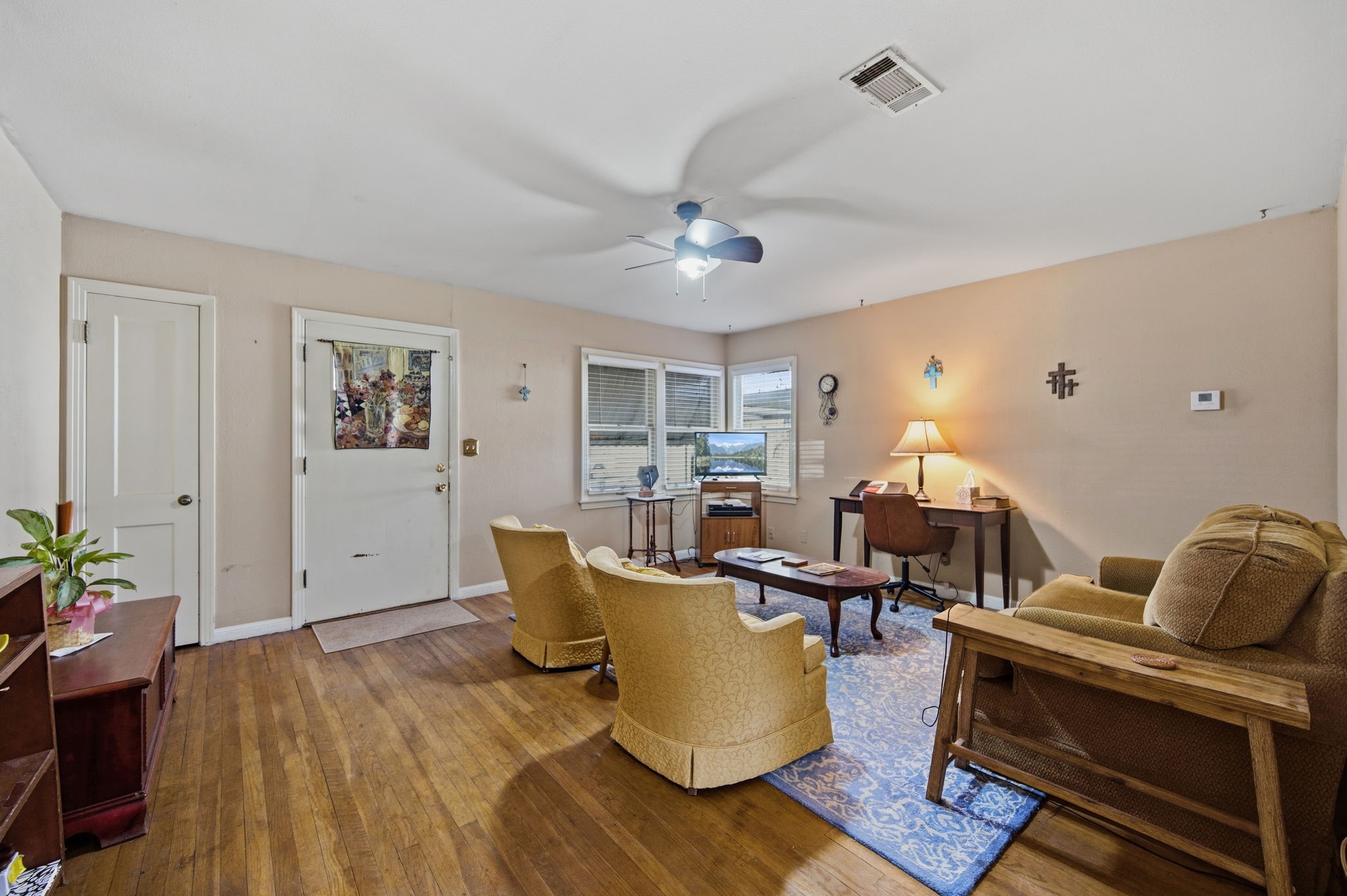 1604 Kipling Street Liberty, TX 77575 - Photo 4 of 19 a living room with furniture and wooden floor