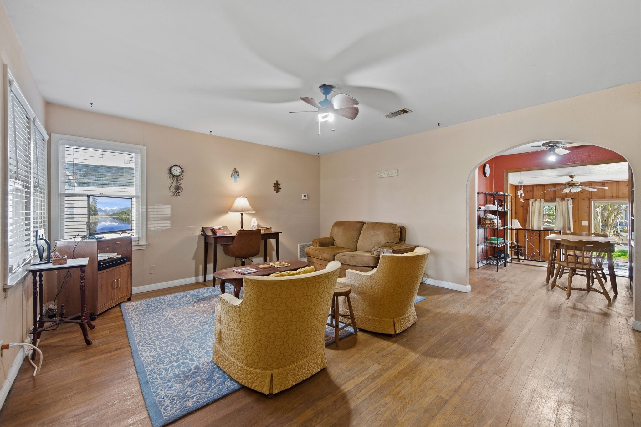 1604 Kipling Street Liberty, TX 77575 - Photo 5 of 19 a living room with furniture a table and wooden floor