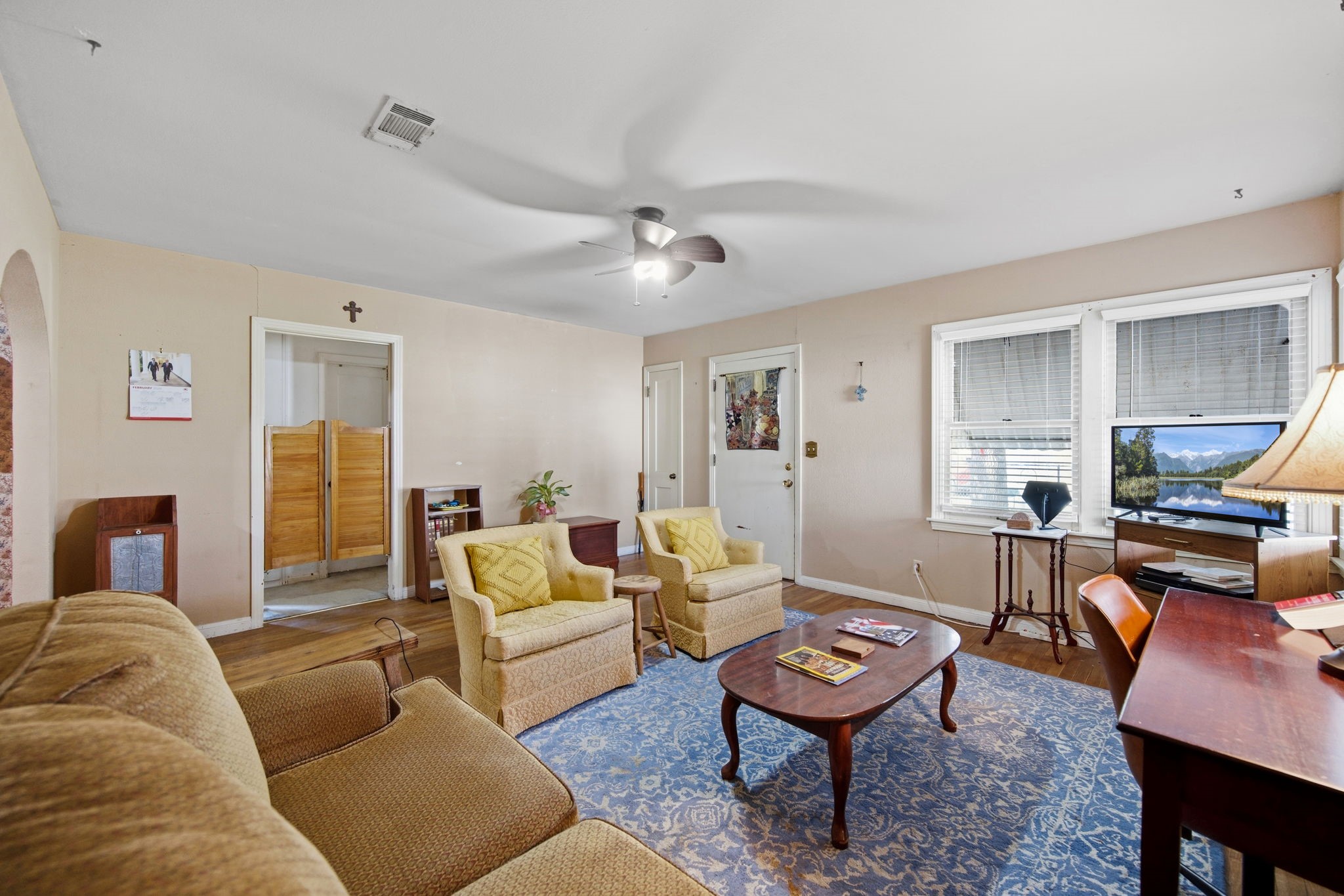 1604 Kipling Street Liberty, TX 77575 - Photo 6 of 19 a living room with furniture a rug and a window