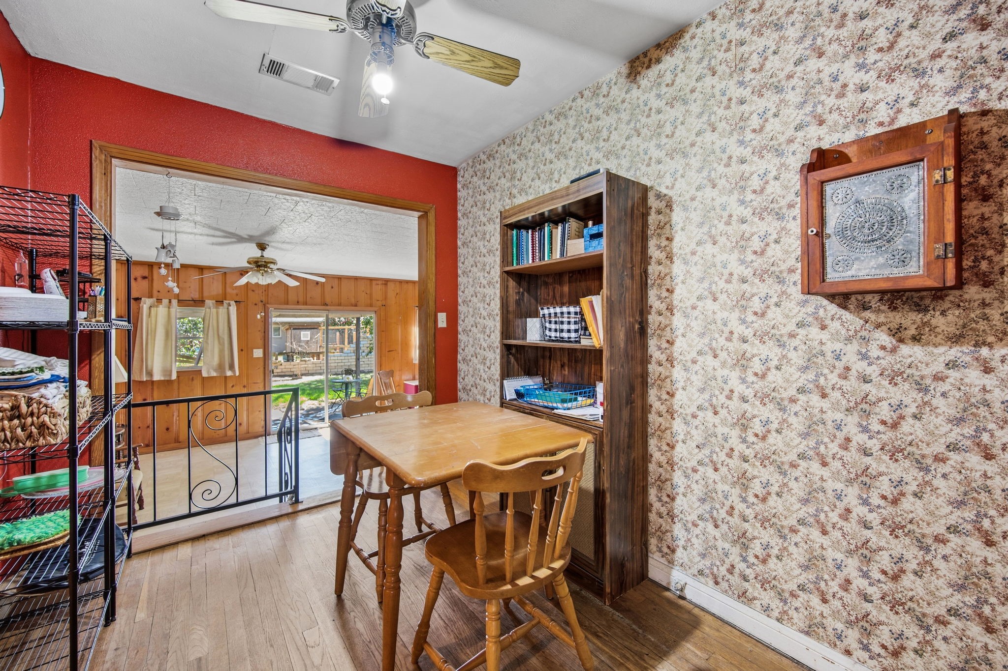 1604 Kipling Street Liberty, TX 77575 - Photo 10 of 19 a view of a dining room with furniture and wooden floor