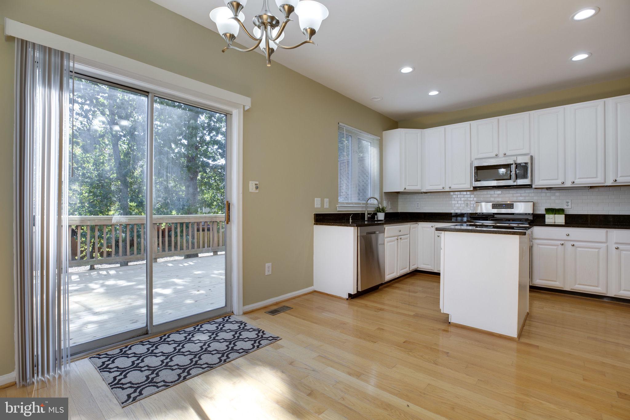 14851 Bolton Road Centreville, VA 20121 - Photo 19 of 44 Enjoy Deck Access from Kitchen