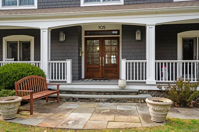 a view of a chair and fire pit in the patio