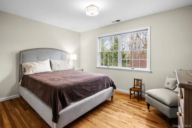 a bathroom with a shower sink and vanity