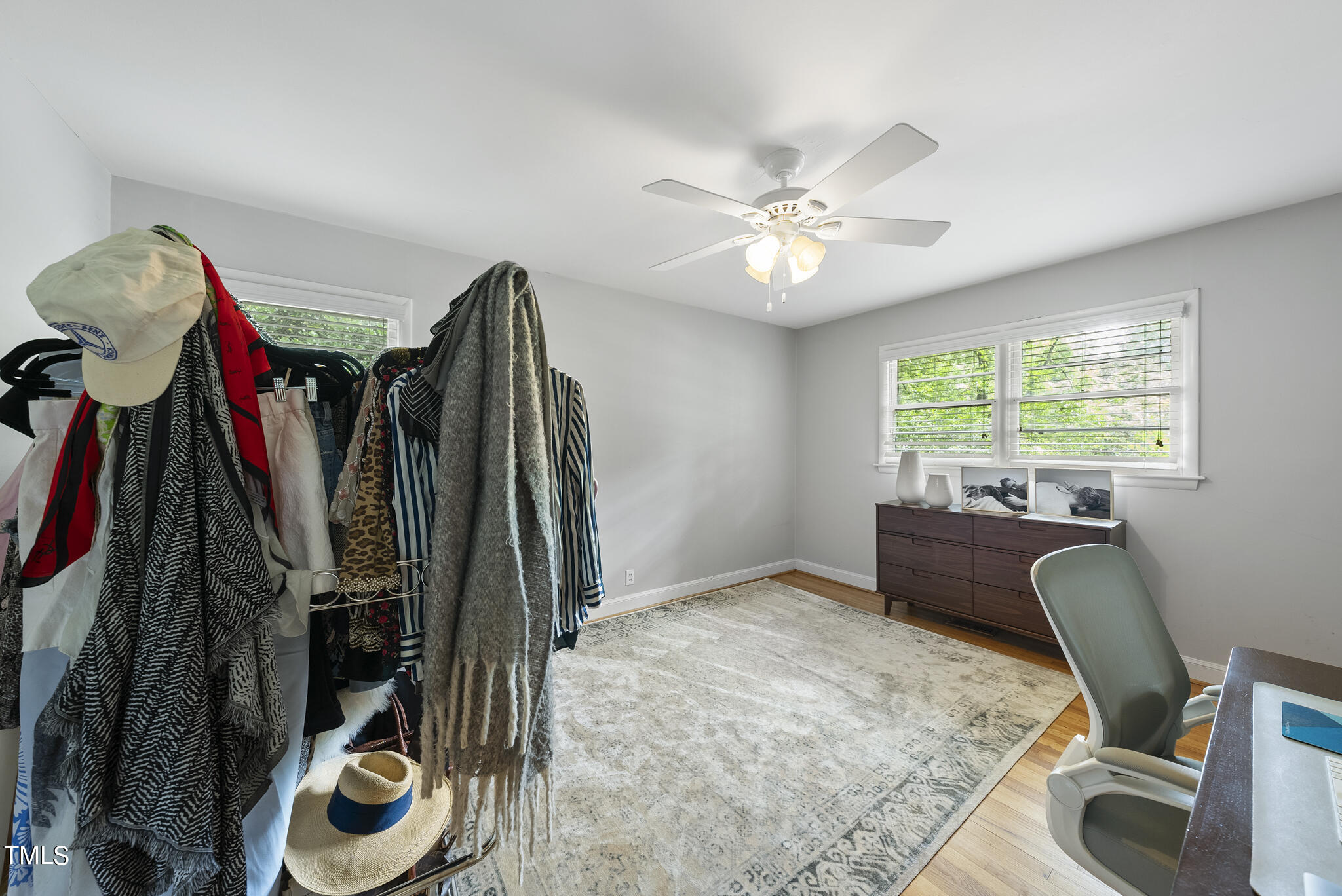 819 Beaver Dam Road Raleigh, NC 27607 - Photo 18 of 28 a view of a workspace with furniture and a window