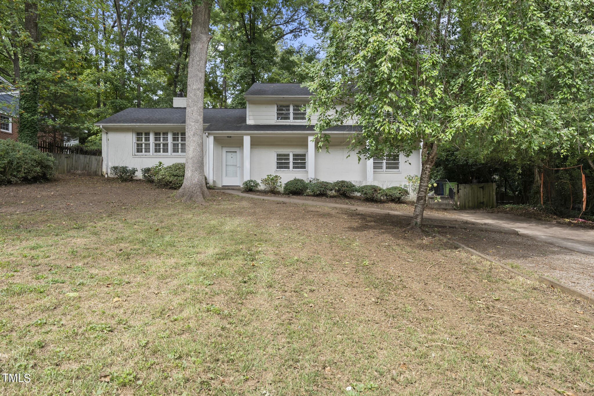 819 Beaver Dam Road Raleigh, NC 27607 - Photo 28 of 28 front view of a house with a yard