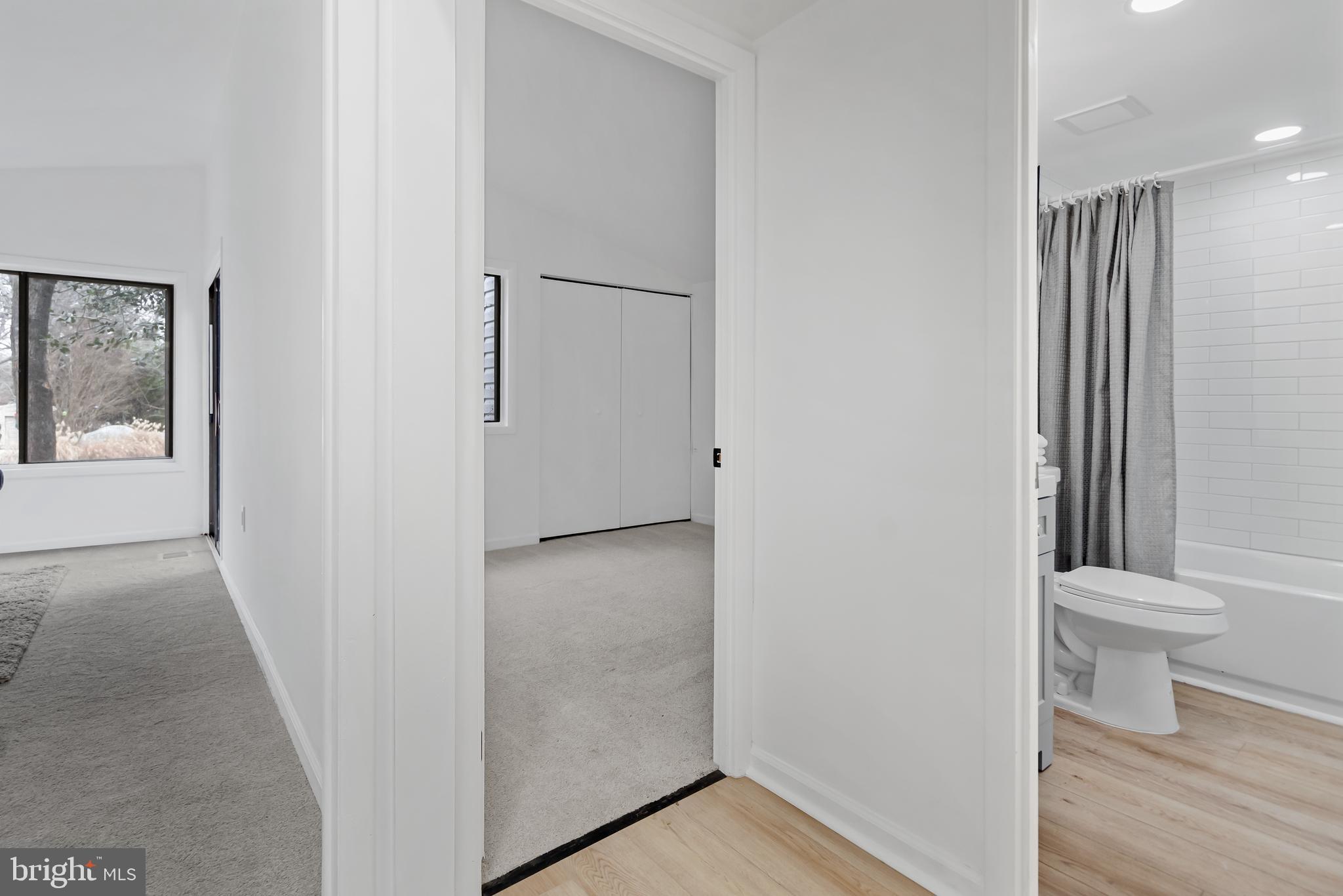 6136 Sinbad Place Columbia, MD 21045 - Photo 22 of 31 a view of bathroom with toilet and a shower