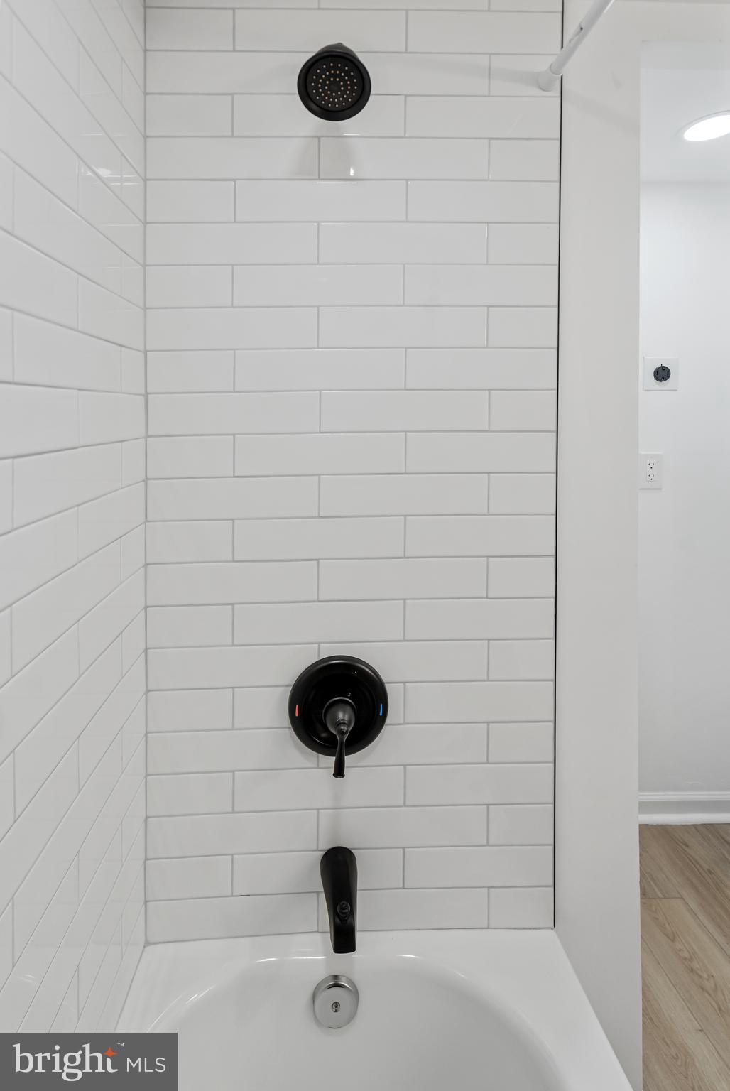 6136 Sinbad Place Columbia, MD 21045 - Photo 23 of 31 a bathroom with a shower