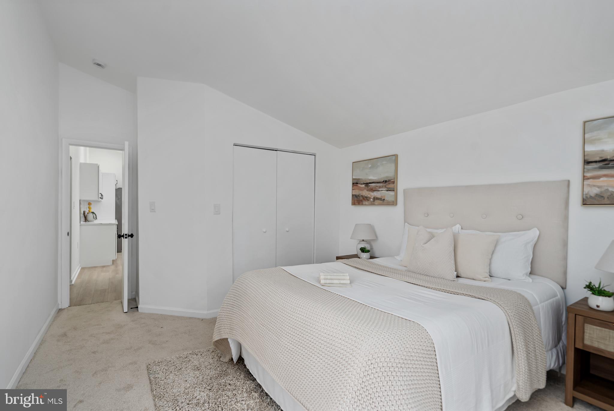 6136 Sinbad Place Columbia, MD 21045 - Photo 26 of 31 a bedroom with a bed and a painting