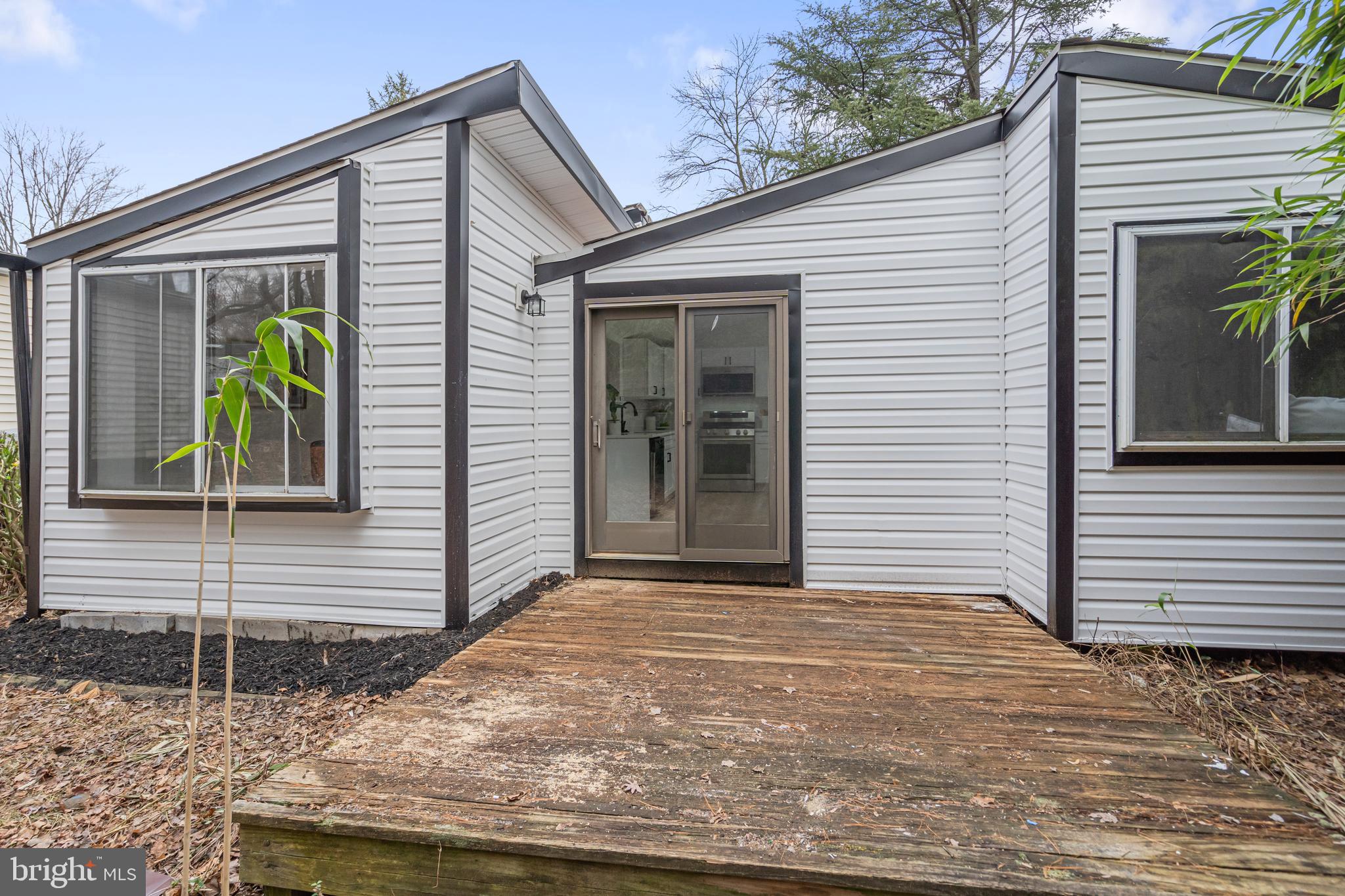 6136 Sinbad Place Columbia, MD 21045 - Photo 31 of 31 a view of a house with a backyard